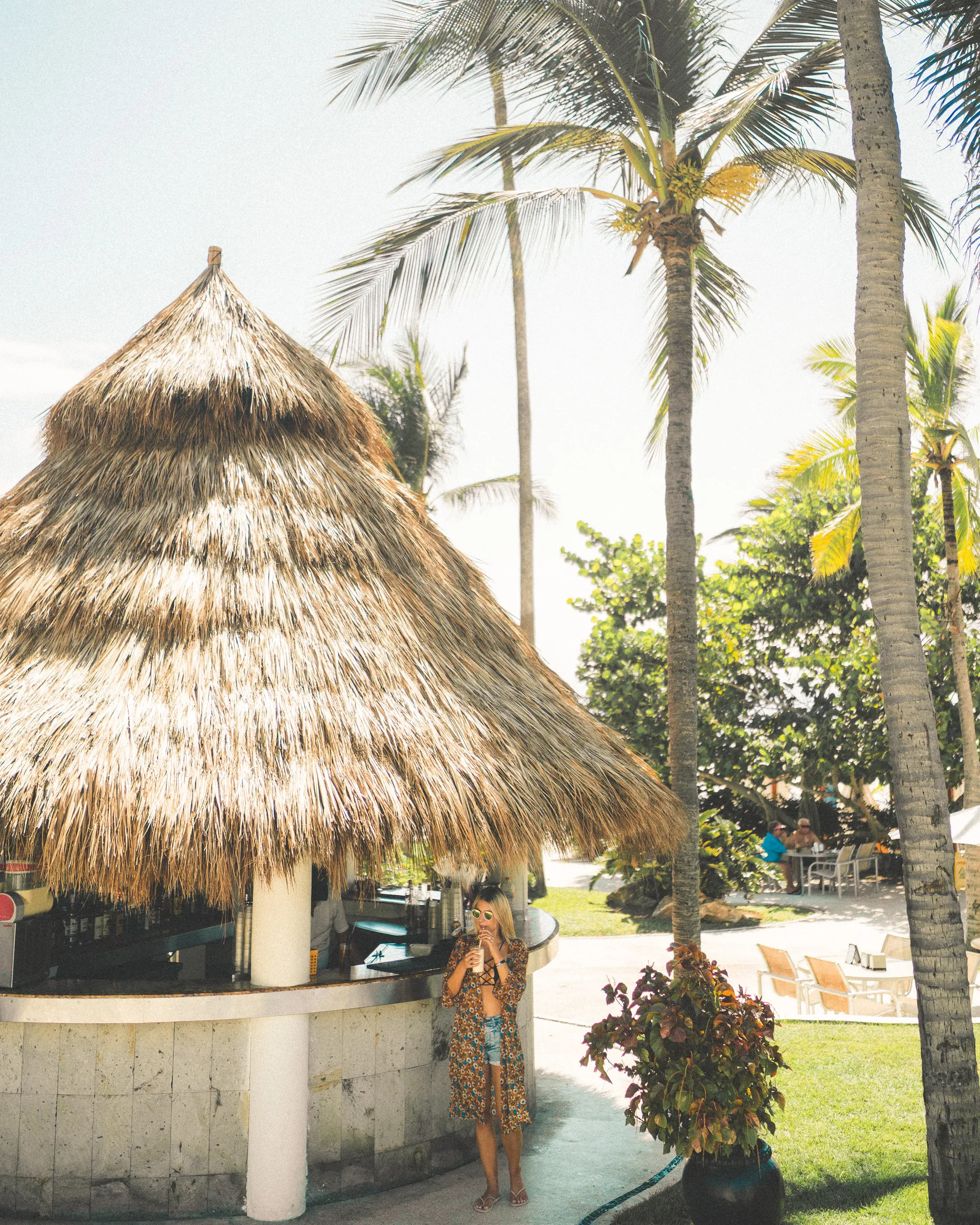 cocktails-by-the-pool-grass-huts-in-puerto-vallarta-mexico.jpg